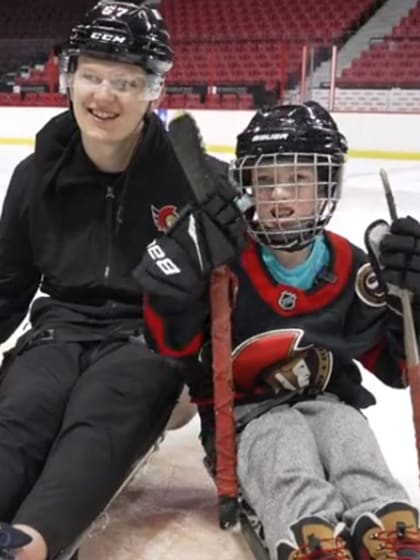 Ottawa Senators Brady Tkachuk plays sled hockey with young fan